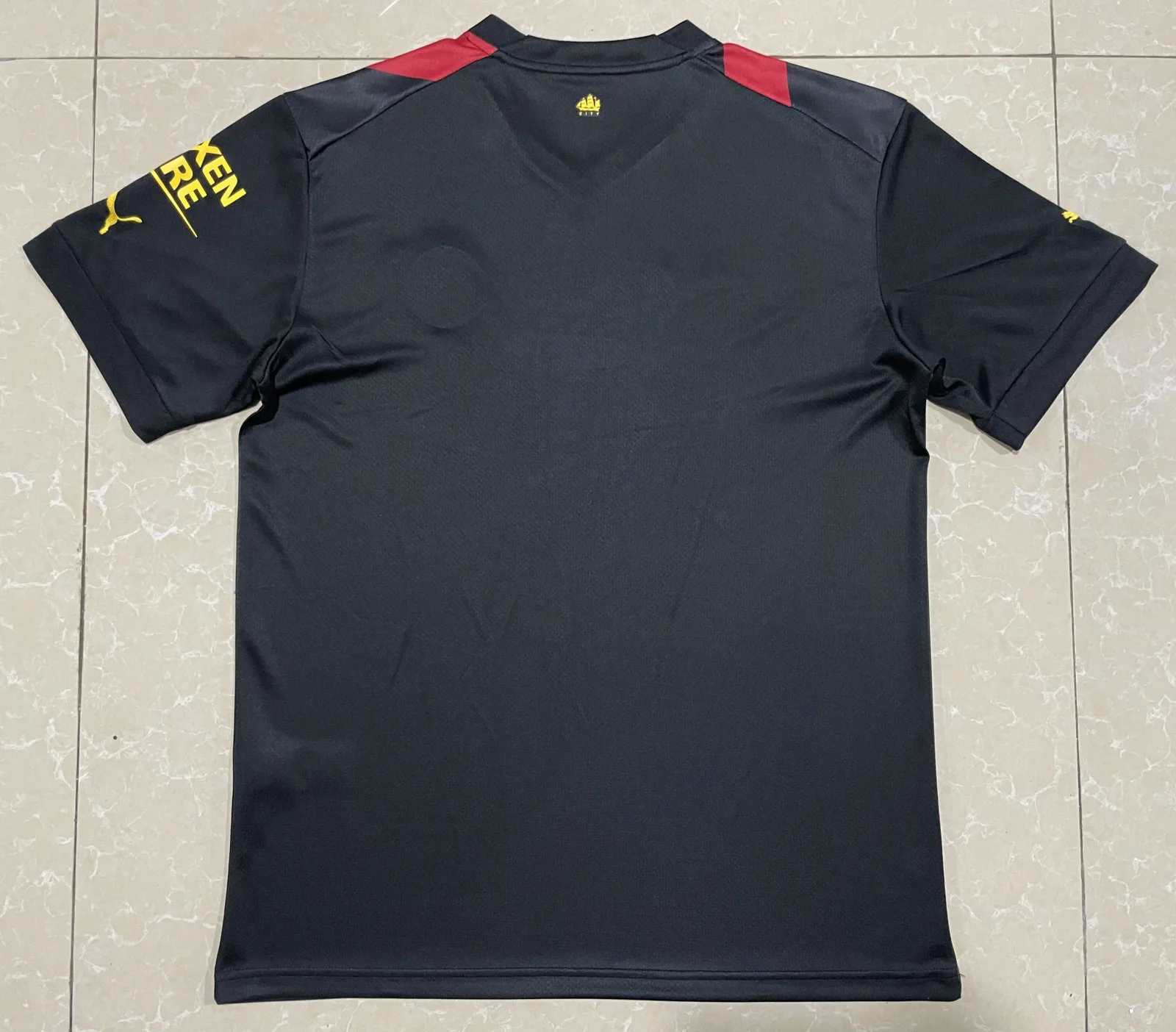 Manchester City 2022/23 Away “Charcoal Orange” — photo 1 of 3